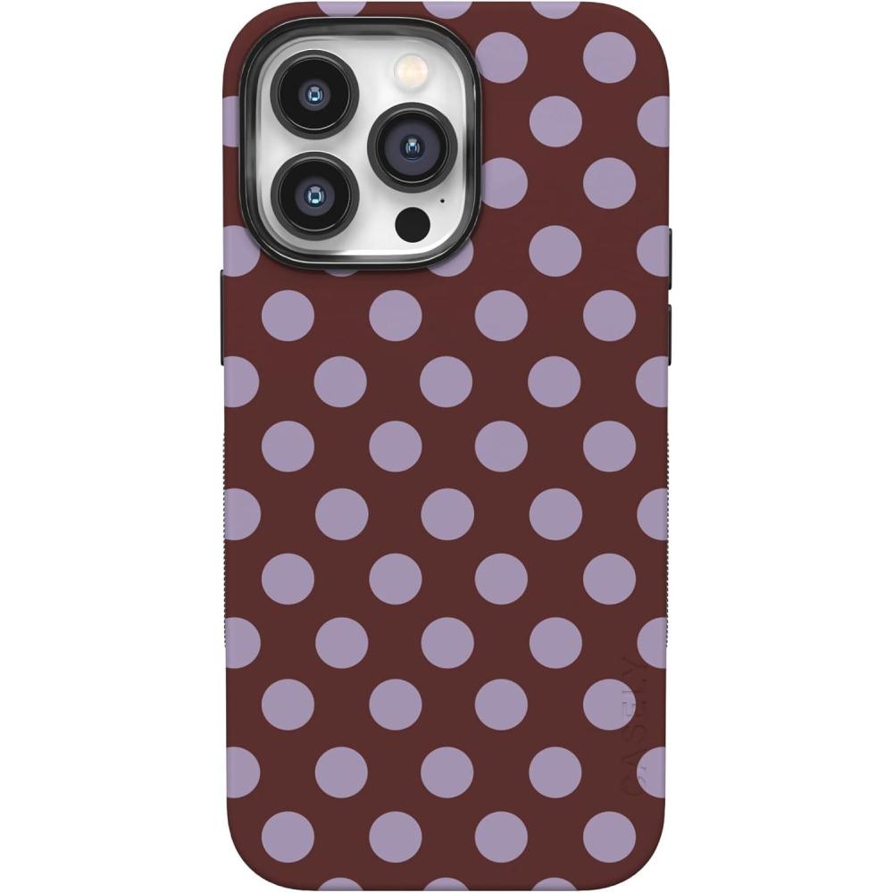 imageCasely iPhone 14 Pro Case  Opposites Attract  Day amp Night Mountains  Compatible with MagSafe  Bold Protective DesignSpotted in SoHo  Burgundy Polka Dot